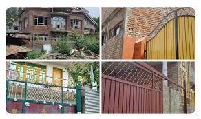 Providing shelter to militants J&K police attach four houses in Srinagar