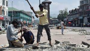 Dilapidated roads across Srinagar cause traffic jams and inconvenience for commuters
